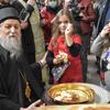 Novčić izvukla devojčica Anastasija Kostić iz Vranja. Foto Eparhija vranjska